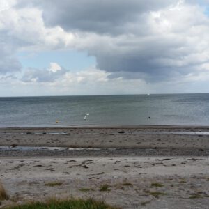 Nordsee-Melancholie – Wolkenzug über stillem Strand“